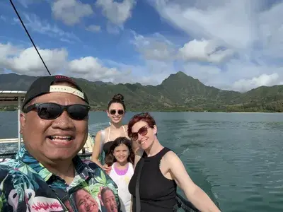 Santos family boat selfie in Hawaii