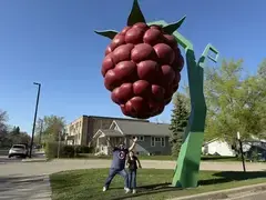 Santos family at the giant raspberry
